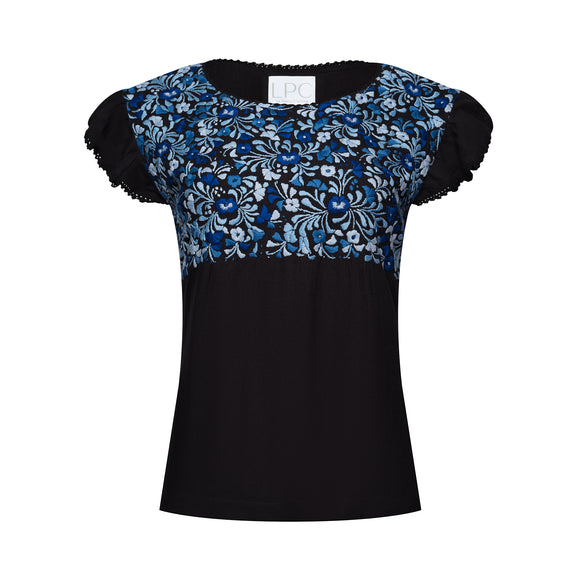 black frilled shirt with frilled sleeves with blue floral accents