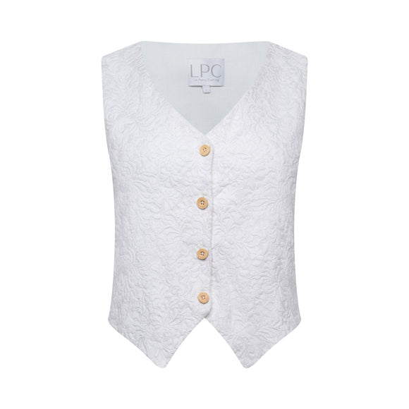 a white floral pattern vest