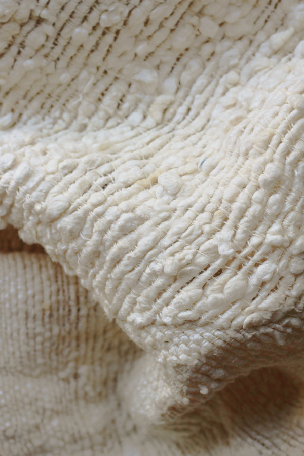 closeup of tan poncho