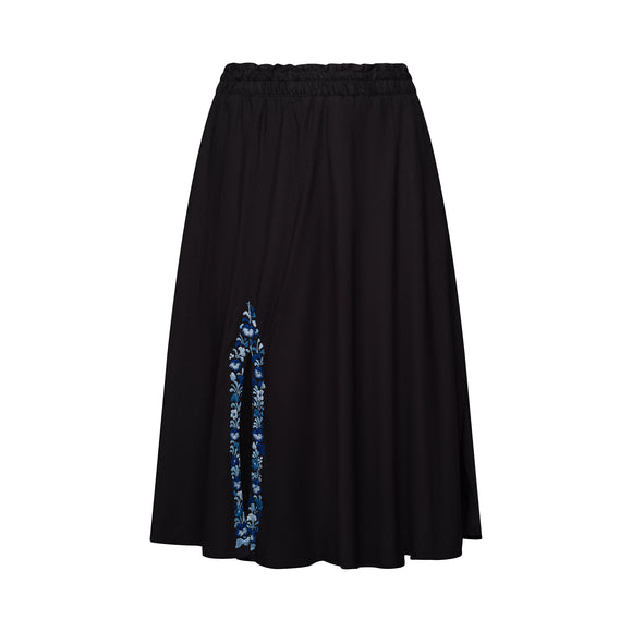 long black skirt with blue floral accents