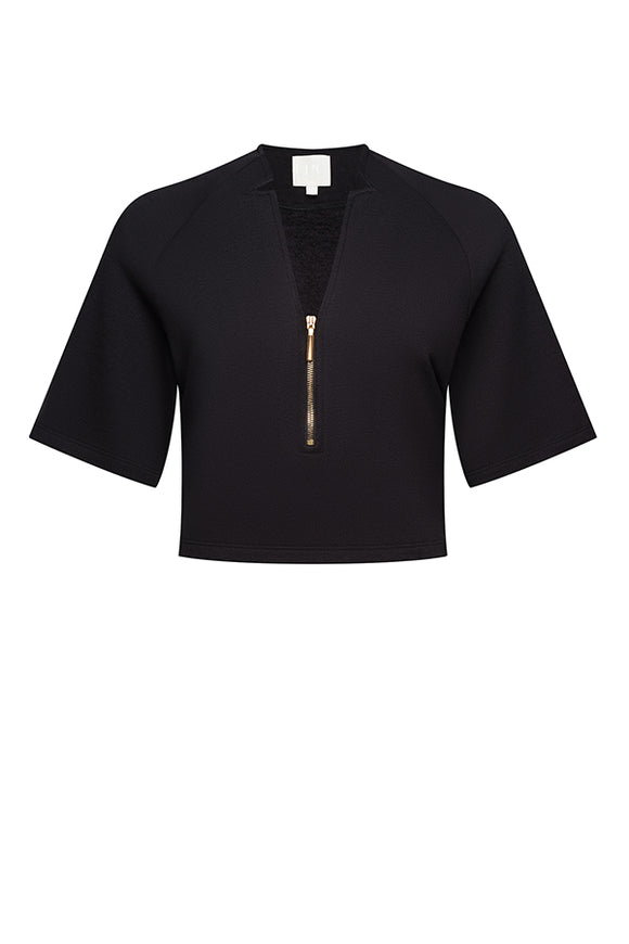 black crop top with gold zipper