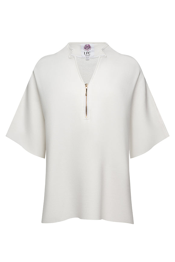 white quarte zip with gold zipper and extended sleeves