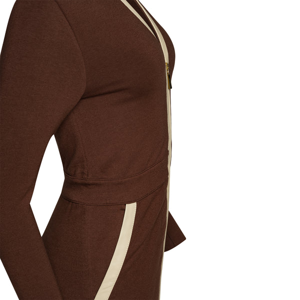 closeup of brown colored jumpsuit with gold zipper, from side angle