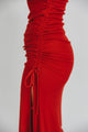 close up of woman wearing red dress