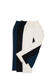 collection of long white, black, and navy blue pants