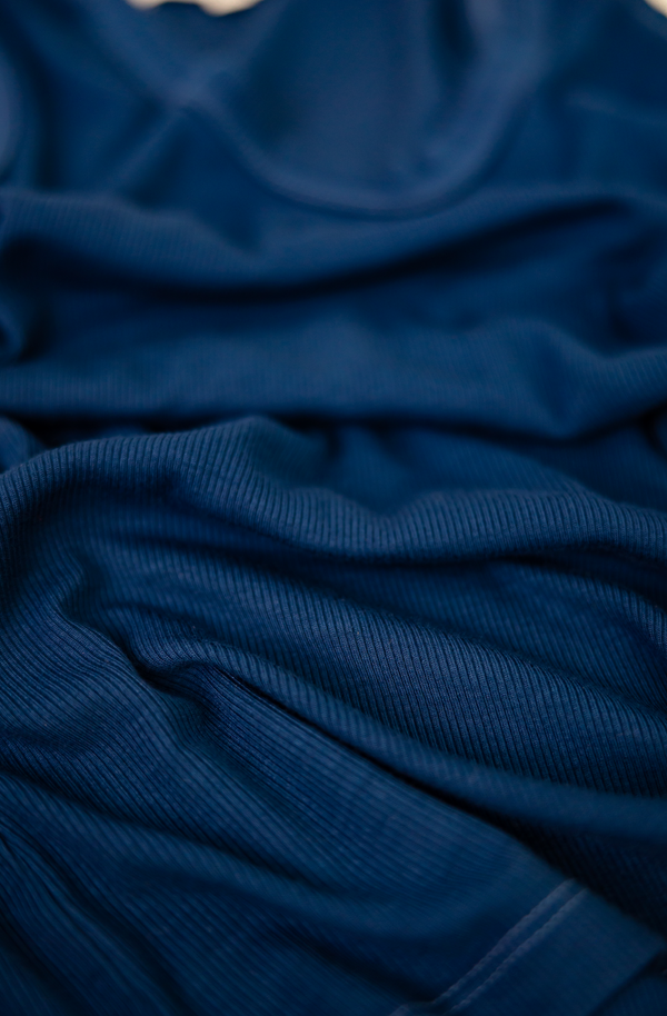 close up on blue tank top