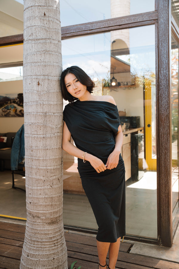 woman wearing long black dress