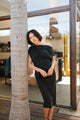 woman wearing long black dress