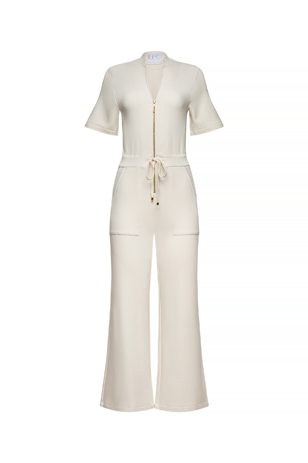 long tan dress, with tan belt with gold zipper