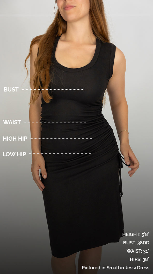 woman wearing long black dress with info about measurements