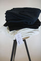three women's stretch pants on a stool in white blue and black